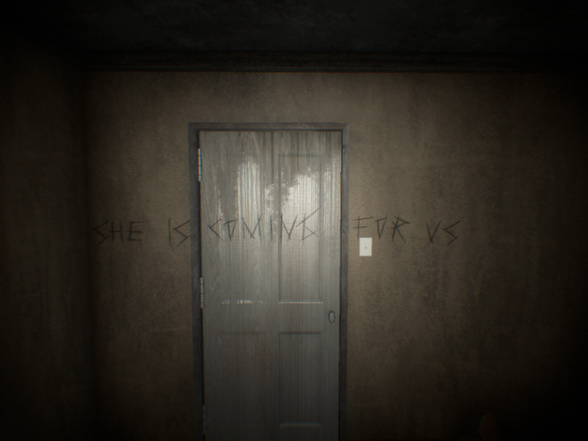 A locked door in a dark room. The words "She is coming for us" are scratched on the walls and the door